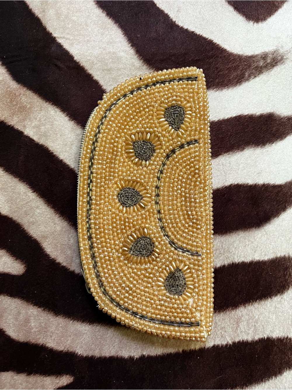 Beaded Sun Clutch in Golden and Silver Metallic.